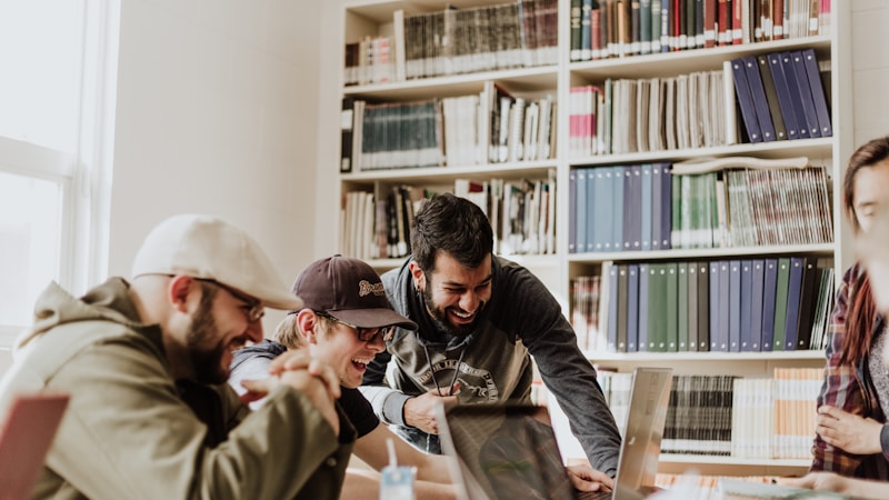 Graduate throwing cap representing student loan freedom